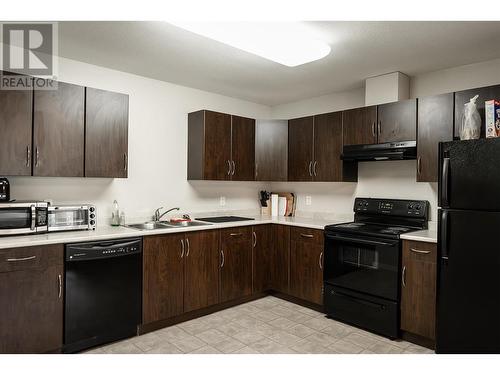 1481 Glenmore Road N Unit# 301, Kelowna, BC - Indoor Photo Showing Kitchen With Double Sink