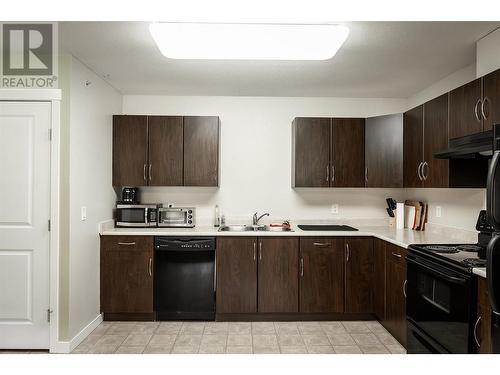 1481 Glenmore Road N Unit# 301, Kelowna, BC - Indoor Photo Showing Kitchen With Double Sink