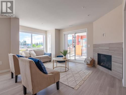 3362 Skaha Lake Road Unit# 305, Penticton, BC - Indoor Photo Showing Living Room With Fireplace