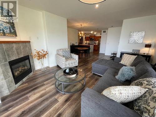 250 Marina Way Unit# 101, Penticton, BC - Indoor Photo Showing Living Room With Fireplace