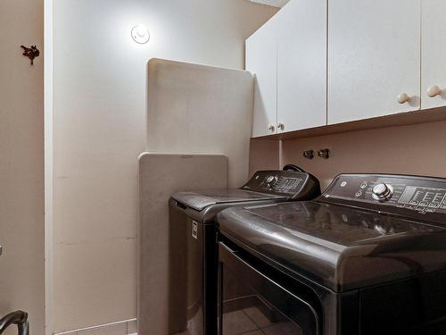 Salle de lavage - 105-6850 Boul. Des Roseraies, Montréal (Anjou), QC - Indoor Photo Showing Laundry Room