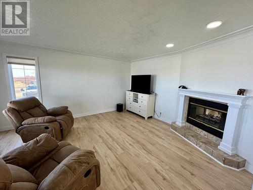13033 221 Road, Dawson Creek, BC - Indoor Photo Showing Living Room With Fireplace