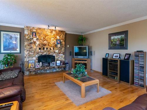 1414 Vella Road, Salmon Arm, BC - Indoor Photo Showing Living Room With Fireplace