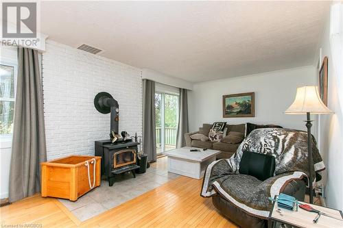 134819 Sideroad 15, Grey Highlands, ON - Indoor Photo Showing Living Room With Fireplace