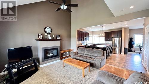 117 Putters Lane, Elbow, SK - Indoor Photo Showing Living Room With Fireplace