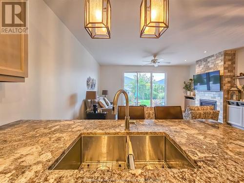 109 Cottage Place, Chatham, ON - Indoor Photo Showing Kitchen With Fireplace With Double Sink