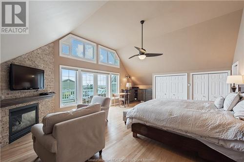 40 Albenie St, Grand-Barachois, NB - Indoor Photo Showing Bedroom With Fireplace