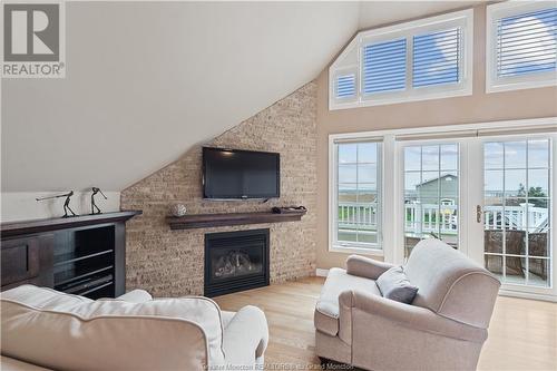 40 Albenie St, Grand-Barachois, NB - Indoor Photo Showing Living Room With Fireplace