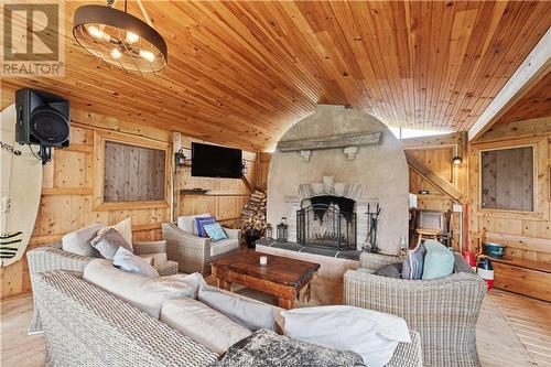 40 Albenie St, Grand-Barachois, NB - Indoor Photo Showing Living Room With Fireplace