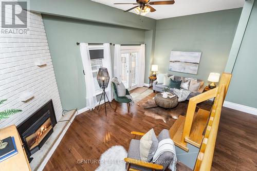 50 Leeson Street N, East Luther Grand Valley, ON - Indoor Photo Showing Other Room With Fireplace