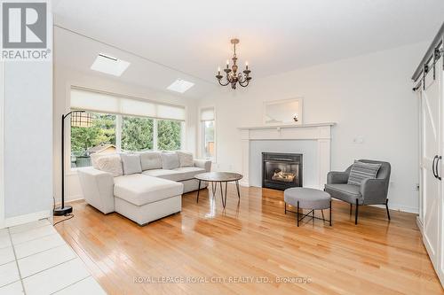 102 Downey Rd, Guelph, ON - Indoor Photo Showing Living Room With Fireplace