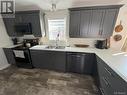 43 Ivory Court, Woodstock, NB  - Indoor Photo Showing Kitchen With Double Sink 