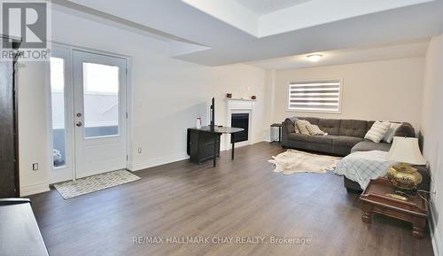 1651 Rizzardo Crescent, Innisfil, ON - Indoor Photo Showing Living Room With Fireplace