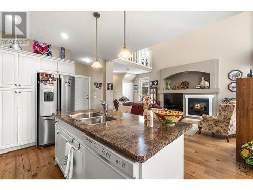 671 24 Street Ne Unit# 18, Salmon Arm, BC - Indoor Photo Showing Kitchen With Fireplace With Double Sink