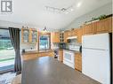 5474 Tatton Station Road, 100 Mile House, BC  - Indoor Photo Showing Kitchen With Double Sink 