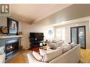 112 Regina Avenue Unit# 105, Penticton, BC  - Indoor Photo Showing Living Room With Fireplace 