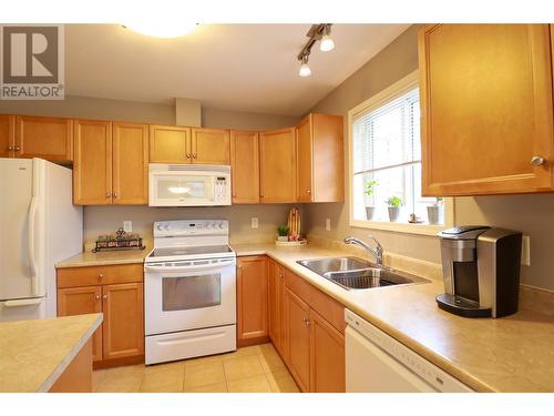 112 Regina Avenue Unit# 105, Penticton, BC - Indoor Photo Showing Kitchen With Double Sink
