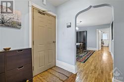 2nd unit- 2 bedroom +Den.  Spacious entrance way to this beautiful unit. Arched doorway that adds character. Beautiful hardwood floor. - 