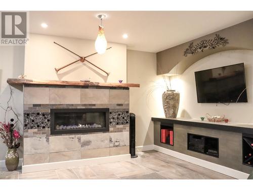 4110 36Th Avenue Unit# 22, Osoyoos, BC - Indoor Photo Showing Living Room With Fireplace