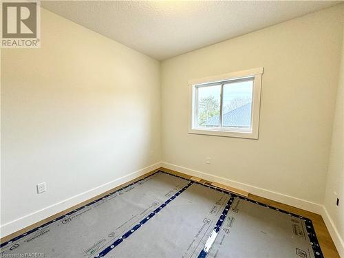 Bedroom 2 of 2 on the main floor - 48 John Crescent, Chepstow, ON - Indoor Photo Showing Other Room