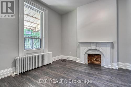 81 Colbourne St, Hamilton, ON - Indoor Photo Showing Other Room With Fireplace