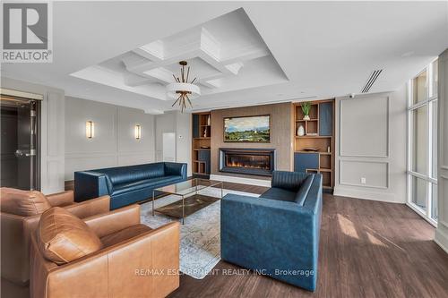 #308 -460 Dundas St E, Hamilton, ON - Indoor Photo Showing Living Room With Fireplace