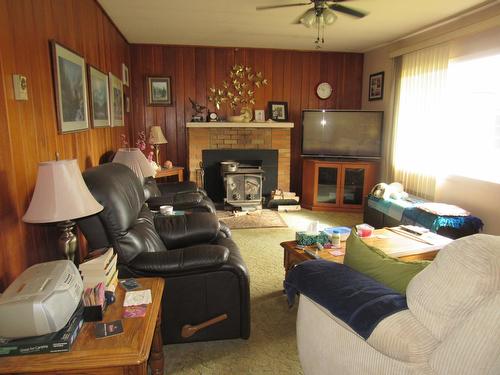 2229 11Th Avenue, Castlegar, BC - Indoor Photo Showing Living Room With Fireplace