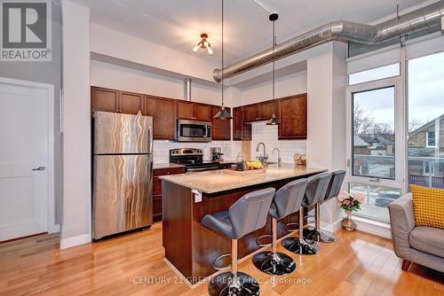 #203 -42 Bridgeport Rd E, Waterloo, ON - Indoor Photo Showing Kitchen With Stainless Steel Kitchen