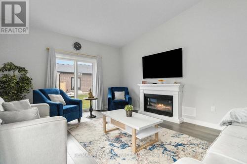 10 - 550 Grey Street W, Brantford, ON - Indoor Photo Showing Living Room With Fireplace
