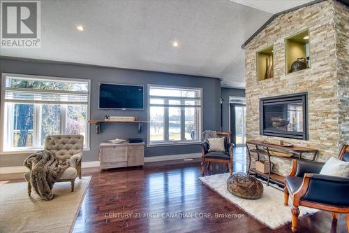 7242 Grande River Line, Chatham-Kent (Chatham), ON - Indoor Photo Showing Living Room With Fireplace