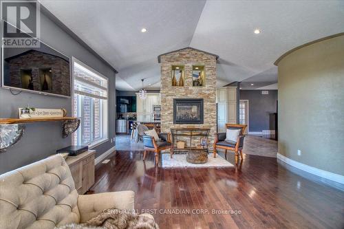 7242 Grande River Line, Chatham-Kent (Chatham), ON - Indoor Photo Showing Living Room With Fireplace