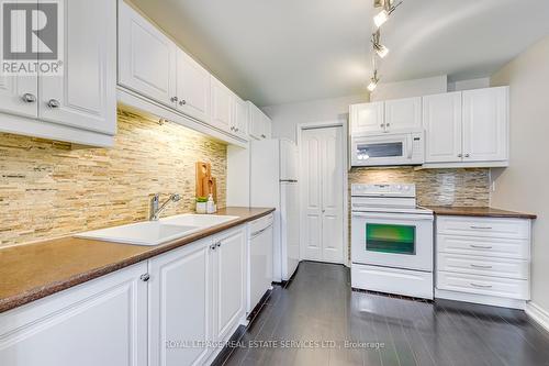 #53 -2701 Aquitaine Ave, Mississauga, ON - Indoor Photo Showing Kitchen With Double Sink