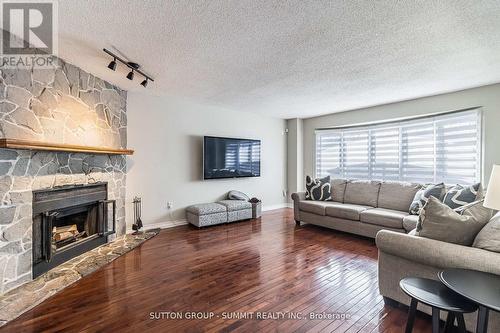 4338 Spinningdale Court, Mississauga, ON - Indoor Photo Showing Living Room With Fireplace