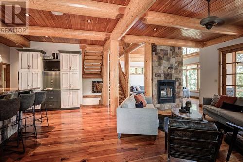 186 Bons Vivants Drive, Noelville, ON - Indoor Photo Showing Living Room With Fireplace
