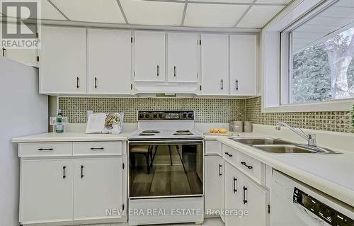 7 Greening Crescent, Toronto, ON - Indoor Photo Showing Kitchen With Double Sink