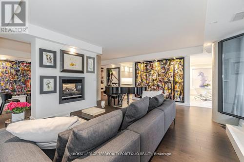 #115 -2095 Lake Shore Blvd W, Toronto, ON - Indoor Photo Showing Living Room With Fireplace