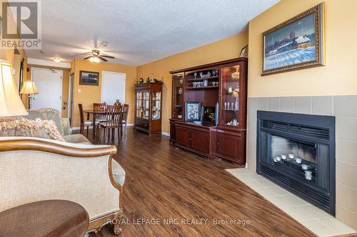 314 - 78 Roehampton Avenue, St. Catharines, ON - Indoor Photo Showing Living Room With Fireplace