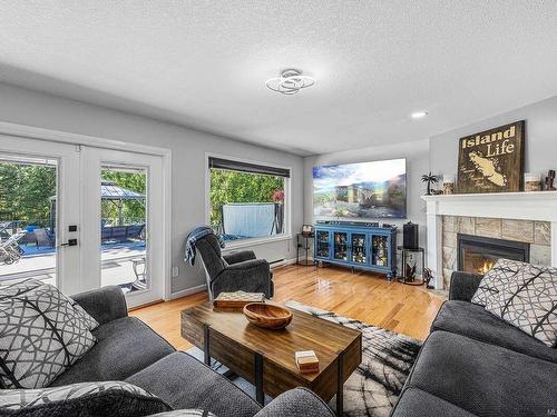 6299 Cherry Creek Rd, Port Alberni, BC - Indoor Photo Showing Living Room With Fireplace