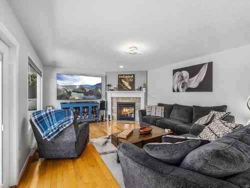 6299 Cherry Creek Rd, Port Alberni, BC - Indoor Photo Showing Living Room With Fireplace