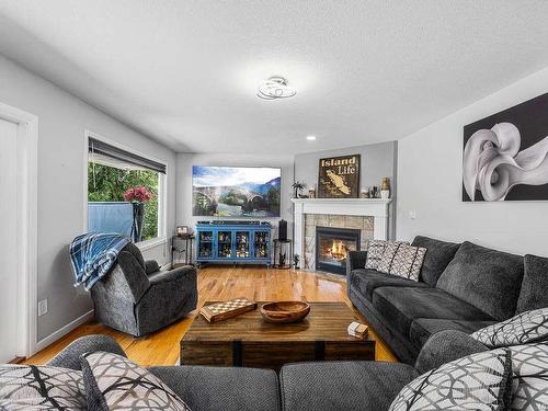 6299 Cherry Creek Rd, Port Alberni, BC - Indoor Photo Showing Living Room With Fireplace