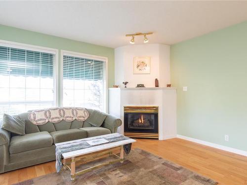 5992 Schooner Way, Nanaimo, BC - Indoor Photo Showing Living Room With Fireplace