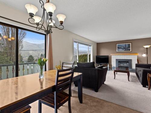 319 Crawford Crt, Kamloops, BC - Indoor Photo Showing Dining Room With Fireplace