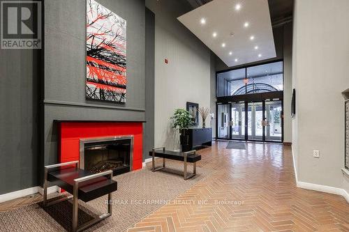 #413 -66 Bay St S, Hamilton, ON - Indoor With Fireplace