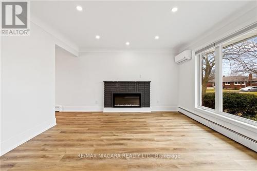 14 Glencairn Dr, St. Catharines, ON - Indoor Photo Showing Other Room With Fireplace