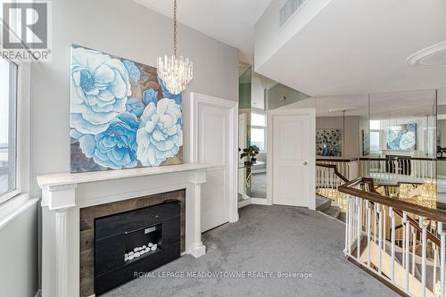 Ph10 - 1300 Bloor Street, Mississauga, ON - Indoor With Fireplace