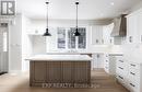 8 Alexander St, Springwater, ON  - Indoor Photo Showing Kitchen With Upgraded Kitchen 