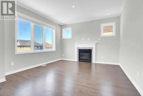 51 Gould Cres, New Tecumseth, ON - Indoor Photo Showing Living Room With Fireplace
