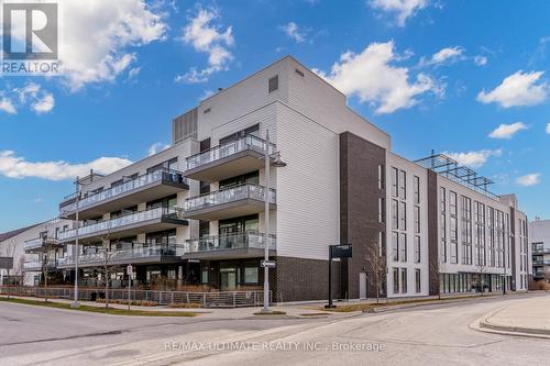 C202 - 301 Sea Ray Avenue, Innisfil, ON - Outdoor With Balcony With Facade
