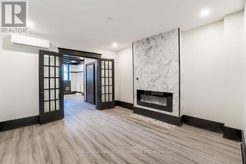 31 Tyndall Ave, Toronto, ON - Indoor With Fireplace