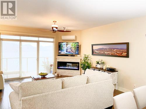 4350 Ponderosa Drive Unit# 220, Peachland, BC - Indoor Photo Showing Living Room With Fireplace